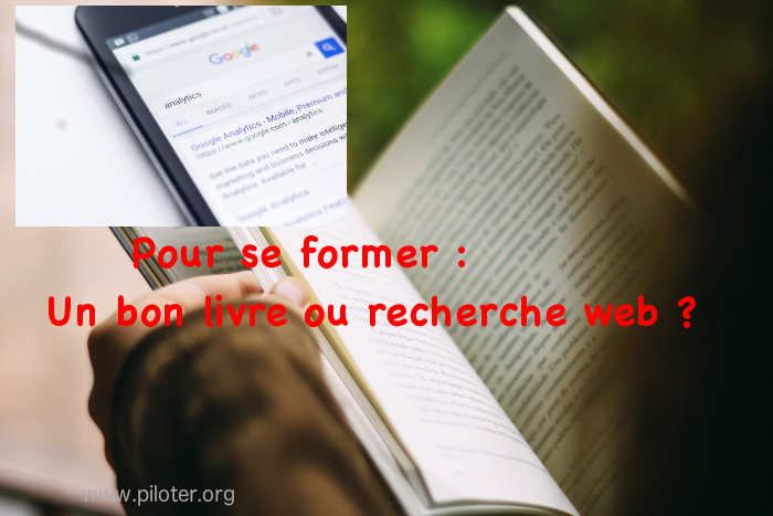 Livre ou web ? Un ouvrage ouvert et un smartphone en recherche web